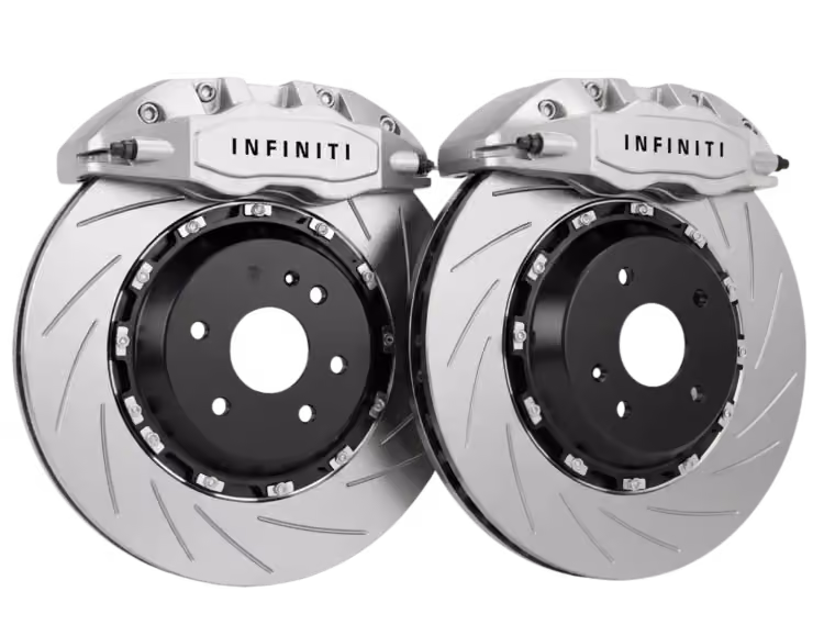 Infiniti brake caliper and rotor being serviced